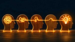 wooden head figure blocks thinking lights brainstorm mindset